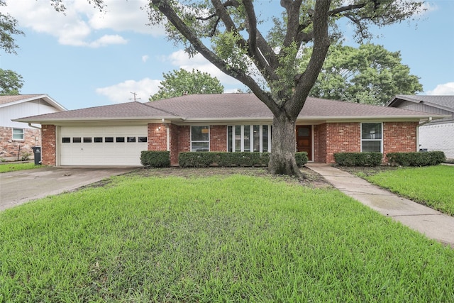 2201 Briarwood Blvd, Arlington, TX 76013 - ranch-style house with a garage, concrete driveway, a front yard, brick siding, and a shingled roof