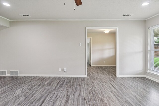 2201 Briarwood Blvd, Arlington, TX 76013 - unfurnished room with ornamental molding, wood finished floors, a ceiling fan, and recessed lighting