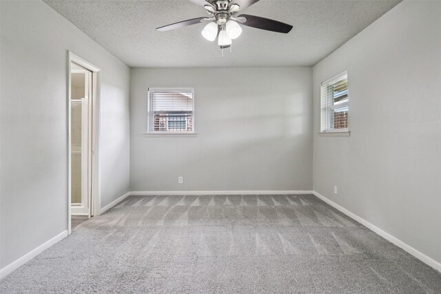 2201 Briarwood Blvd, Arlington, TX 76013 - spare room featuring carpet floors, a textured ceiling, and ceiling fan