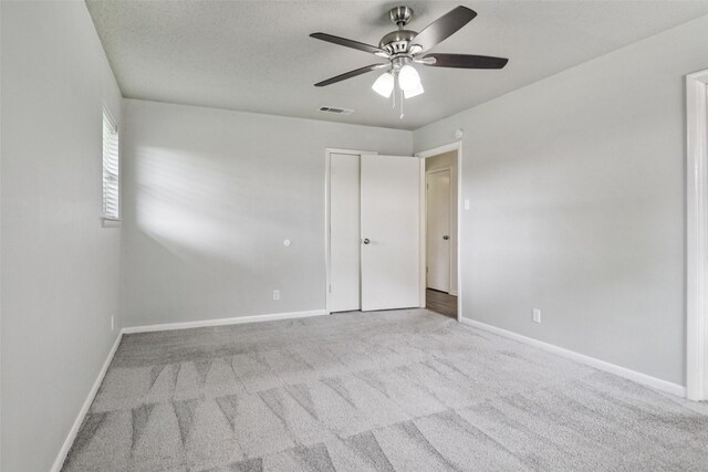 2201 Briarwood Blvd, Arlington, TX 76013 - spare room featuring carpet floors and a ceiling fan