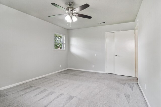 2201 Briarwood Blvd, Arlington, TX 76013 - spare room featuring carpet floors and ceiling fan