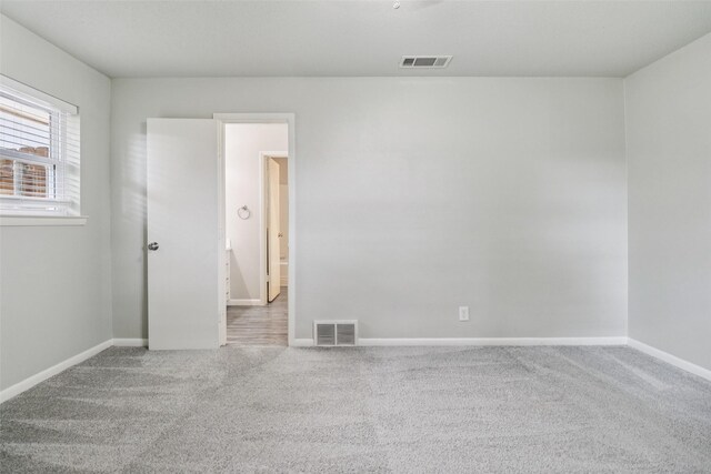 2201 Briarwood Blvd, Arlington, TX 76013 - carpeted spare room featuring baseboards