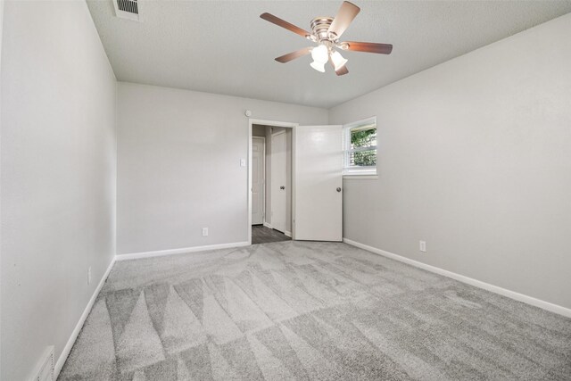 2201 Briarwood Blvd, Arlington, TX 76013 - carpeted empty room featuring ceiling fan and baseboards