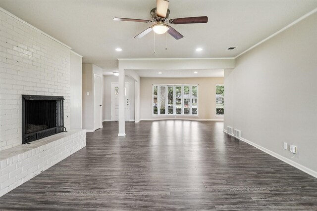 2201 Briarwood Blvd, Arlington, TX 76013 - unfurnished living room with dark wood-style flooring, a ceiling fan, a fireplace, and recessed lighting
