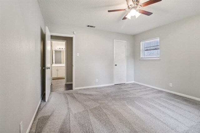 2201 Briarwood Blvd, Arlington, TX 76013 - unfurnished bedroom with carpet floors and ceiling fan