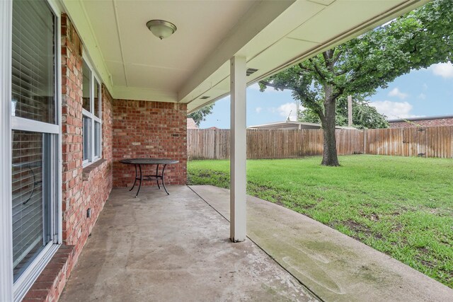 2201 Briarwood Blvd, Arlington, TX 76013 - fenced backyard with a patio area
