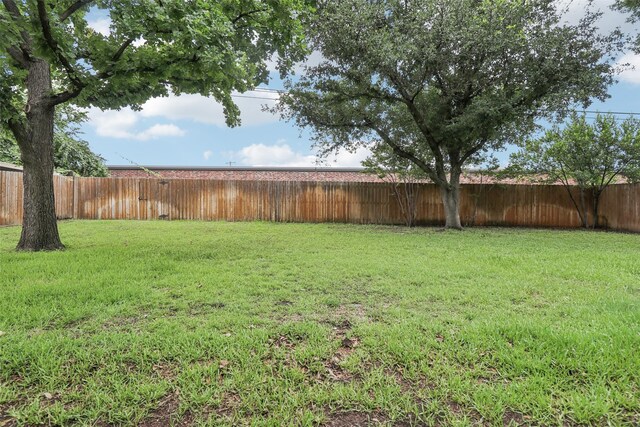 2201 Briarwood Blvd, Arlington, TX 76013 - rear view of house featuring a fenced backyard, a chimney, brick siding, and a patio area