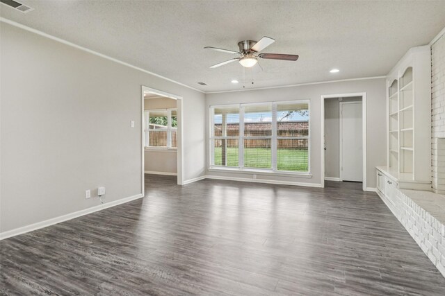 2201 Briarwood Blvd, Arlington, TX 76013 - unfurnished living room featuring a textured ceiling, ceiling fan, dark wood-style flooring, crown molding, and recessed lighting