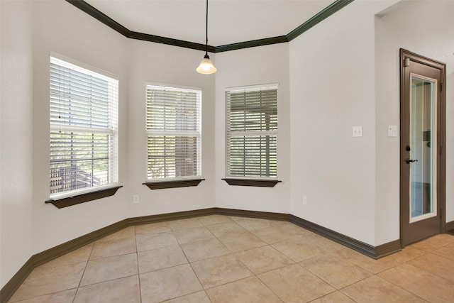 2111 Renaissance Dr, Denison, TX 75020 - spare room with light tile patterned flooring, crown molding, and baseboards