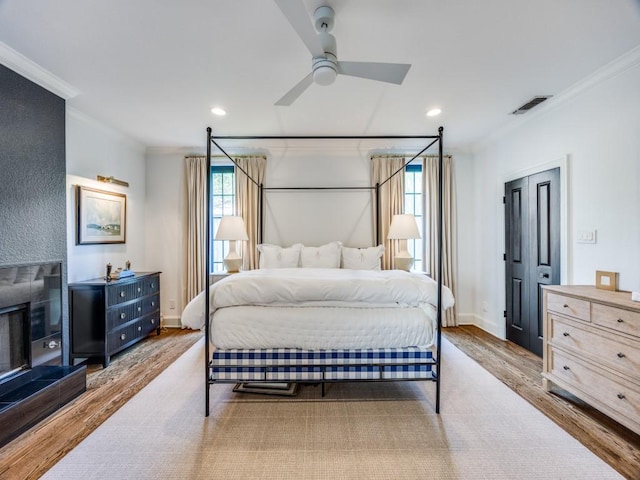 4604 Southern Ave, Highland Park, TX 75209 - bedroom with ornamental molding, wood finished floors, recessed lighting, and baseboards
