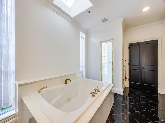 4604 Southern Ave, Highland Park, TX 75209 - bathroom featuring a skylight, crown molding, a whirlpool tub, tile patterned flooring, and baseboards