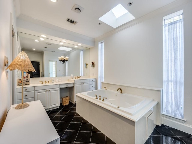 4604 Southern Ave, Highland Park, TX 75209 - bathroom with a skylight, ornamental molding, a whirlpool tub, vanity, and healthy amount of natural light