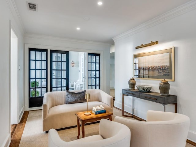 4604 Southern Ave, Highland Park, TX 75209 - living area featuring baseboards, plenty of natural light, crown molding, wood finished floors, and recessed lighting