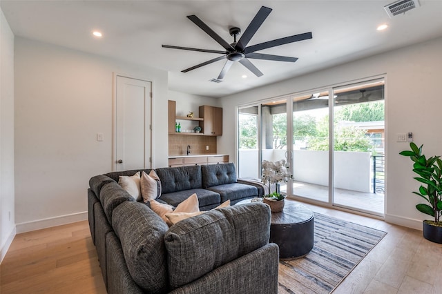 4322 Sexton Ln, Dallas, TX 75229 - living area with recessed lighting, ceiling fan, baseboards, and light wood finished floors