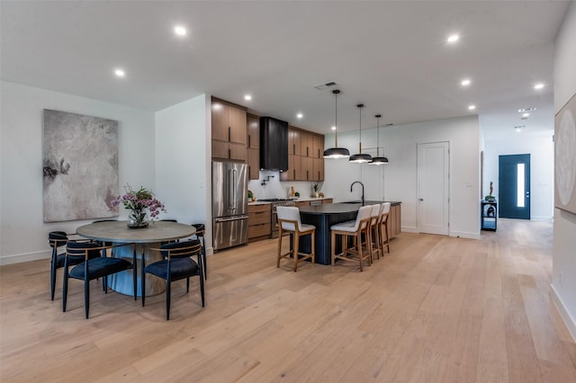 4322 Sexton Ln, Dallas, TX 75229 - dining room with recessed lighting, light wood-type flooring, and baseboards