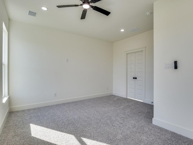 6434 Abner Rd, Terrell, TX 75161 - carpeted empty room featuring a ceiling fan, recessed lighting, baseboards, and a smoke detector