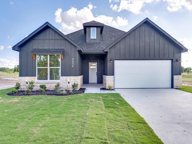 6434 Abner Rd, Terrell, TX 75161 - modern farmhouse with board and batten siding, an attached garage, driveway, roof with shingles, and a front lawn