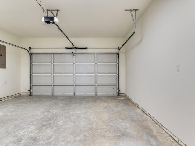 6434 Abner Rd, Terrell, TX 75161 - garage featuring electric panel and a garage door opener
