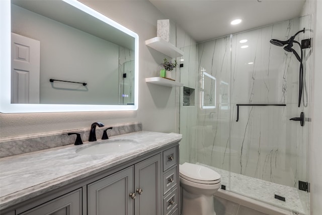 711 Majestic Oaks Dr, Oak Point, TX 75068 - full bath featuring a marble finish shower, vanity, and recessed lighting