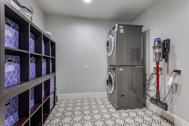711 Majestic Oaks Dr, Oak Point, TX 75068 - washroom with estacked washer and dryer and tile patterned floors