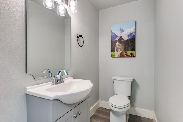 711 Majestic Oaks Dr, Oak Point, TX 75068 - bathroom featuring wood finished floors and vanity