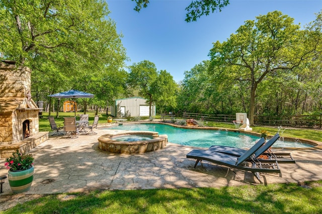 711 Majestic Oaks Dr, Oak Point, TX 75068 - view of pool featuring an outdoor stone fireplace, a patio area, a shed, and a pool with connected hot tub