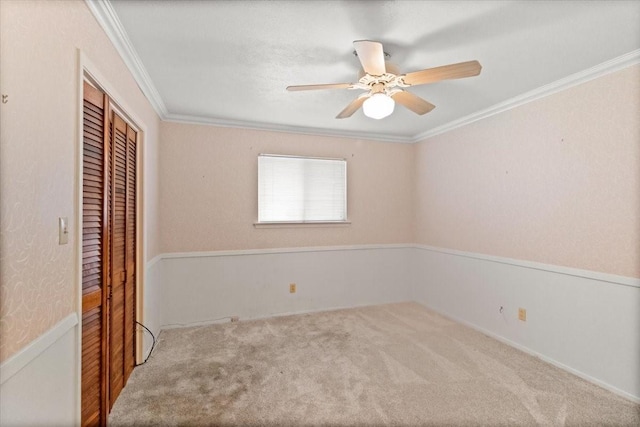1506 Ridgeview Dr, Arlington, TX 76012 - unfurnished bedroom featuring a closet, carpet floors, crown molding, and a ceiling fan