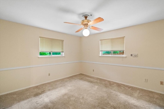 1506 Ridgeview Dr, Arlington, TX 76012 - carpeted spare room with plenty of natural light, baseboards, and a ceiling fan
