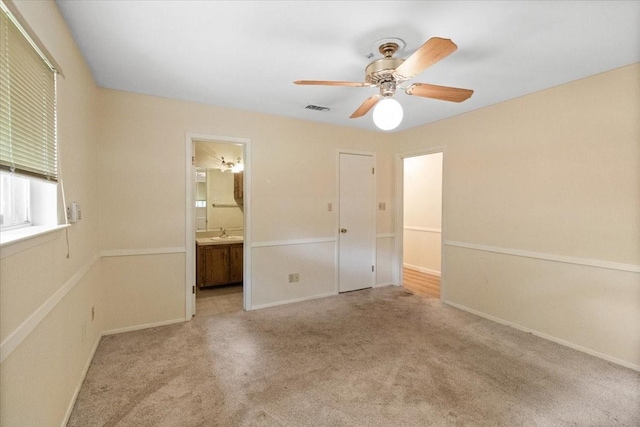 1506 Ridgeview Dr, Arlington, TX 76012 - unfurnished bedroom featuring a sink, carpet, ensuite bath, and baseboards