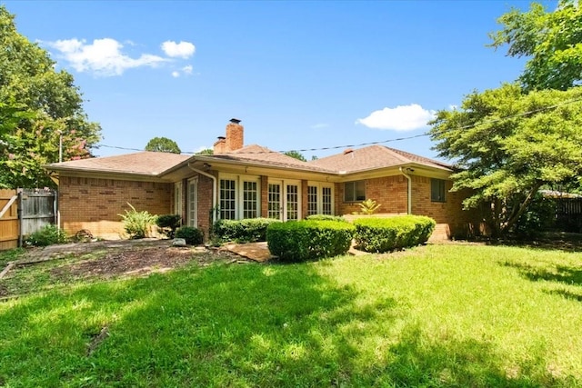 1506 Ridgeview Dr, Arlington, TX 76012 - rear view of house featuring a chimney and brick siding