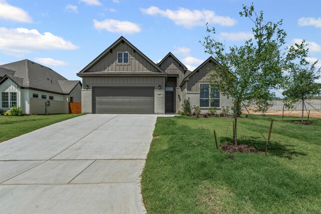 207 Mitchell Dr, Glen Rose, TX 76043 - craftsman-style home with board and batten siding, concrete driveway, and a garage