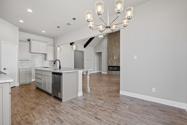 207 Mitchell Dr, Glen Rose, TX 76043 - kitchen featuring a chandelier, open floor plan, stainless steel dishwasher, tasteful backsplash, and recessed lighting
