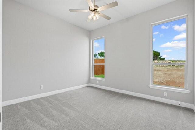 207 Mitchell Dr, Glen Rose, TX 76043 - carpeted spare room featuring baseboards and ceiling fan