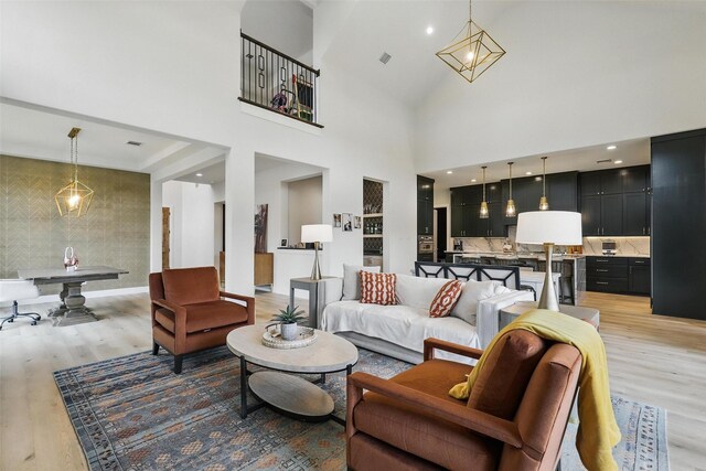 5901 Westworth Falls Way, Westworth Village, TX 76114 - living room featuring light wood-type flooring and a high ceiling