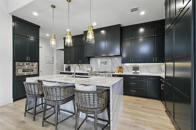 5901 Westworth Falls Way, Westworth Village, TX 76114 - kitchen featuring a sink, oven, light stone countertops, tasteful backsplash, and recessed lighting