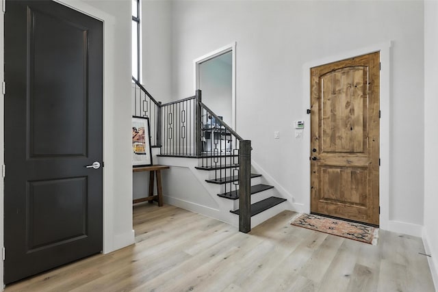5901 Westworth Falls Way, Westworth Village, TX 76114 - foyer with wood finished floors, stairs, and baseboards