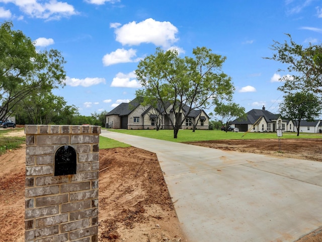 971 County Road 1304, Bridgeport, TX 76426 - view of front facade with a residential view and a front lawn