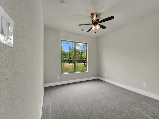 971 County Road 1304, Bridgeport, TX 76426 - empty room with carpet floors, a ceiling fan, baseboards, and a smoke detector