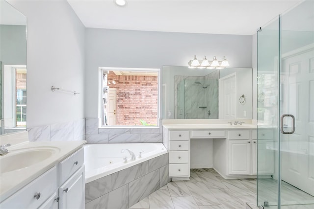 5718 Gloucester Dr, Tyler, TX 75707 - full bath featuring vanity, a stall shower, a jetted tub, and marble look tiles