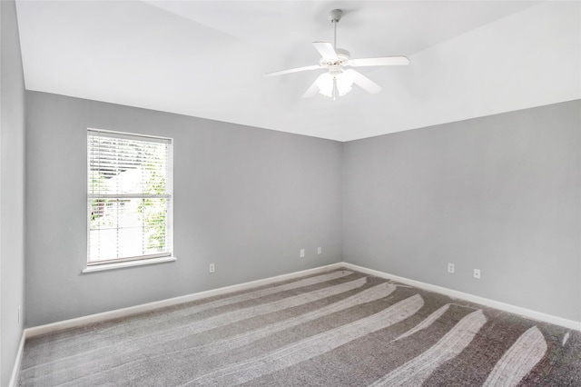 5718 Gloucester Dr, Tyler, TX 75707 - carpeted empty room featuring baseboards and ceiling fan