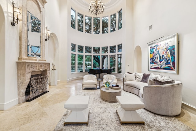 5112 Palomar Ln, Dallas, TX 75229 - living area with a chandelier, baseboards, a high ceiling, and arched walkways