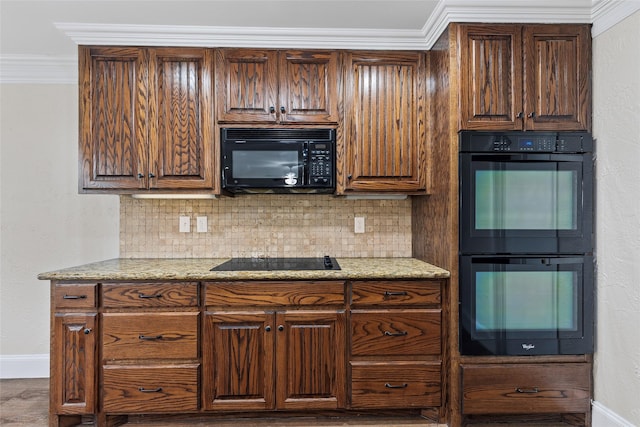 1458 Foxwood Ln, Rockwall, TX 75032 - kitchen featuring black appliances, baseboards, backsplash, and ornamental molding