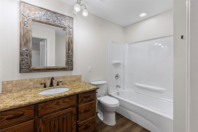 1458 Foxwood Ln, Rockwall, TX 75032 - full bath featuring toilet, vanity, wood finished floors, and shower / tub combination