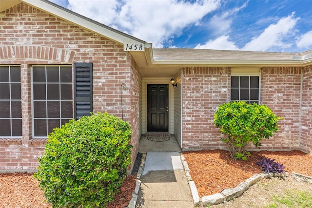 1458 Foxwood Ln, Rockwall, TX 75032 - view of exterior entry with brick siding