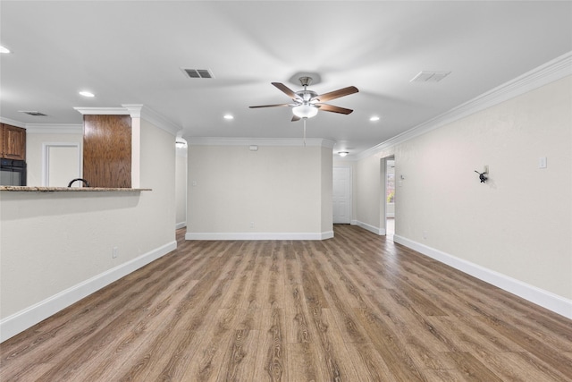 1458 Foxwood Ln, Rockwall, TX 75032 - unfurnished living room featuring recessed lighting, crown molding, a ceiling fan, baseboards, and wood finished floors
