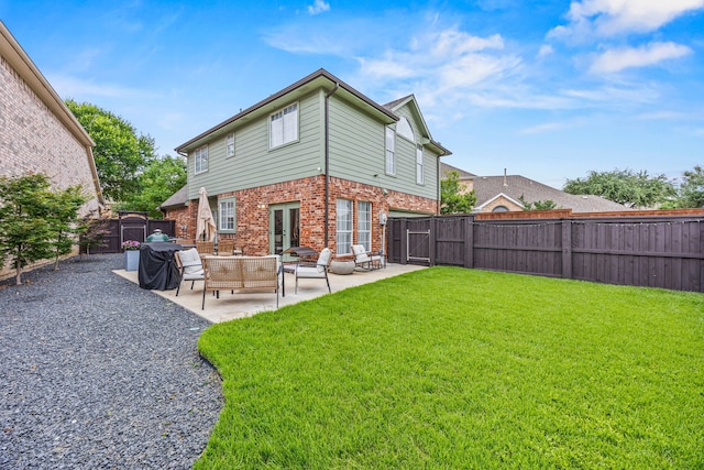 8620 Quail Meadow Dr, Irving, TX 75063 - rear view of property with a gate, brick siding, outdoor lounge area, and a patio area