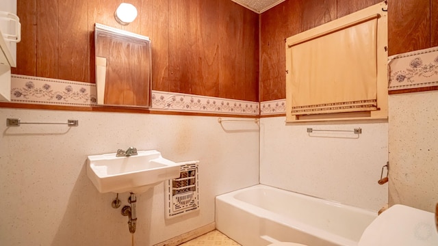 224 Pecan St, Dublin, TX 76446 - bathroom featuring toilet and a bathtub