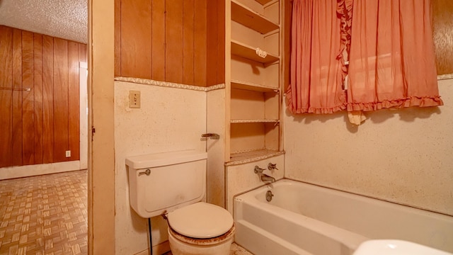 224 Pecan St, Dublin, TX 76446 - bathroom featuring toilet and a tub