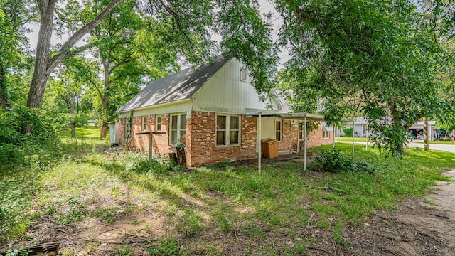 224 Pecan St, Dublin, TX 76446 - view of side of home featuring brick siding