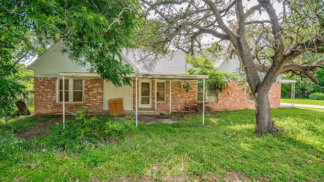 224 Pecan St, Dublin, TX 76446 - view of front facade with brick siding and a front yard